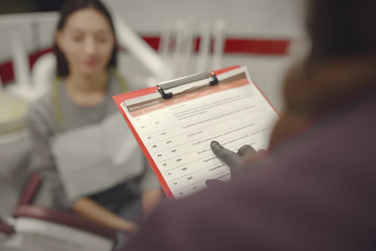Clinical training session — case-review and digital-records walkthrough at the partner facility