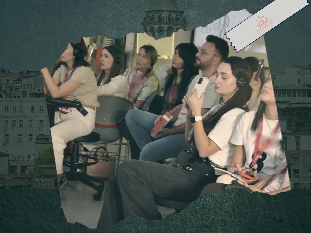 Delegates following a session with headsets