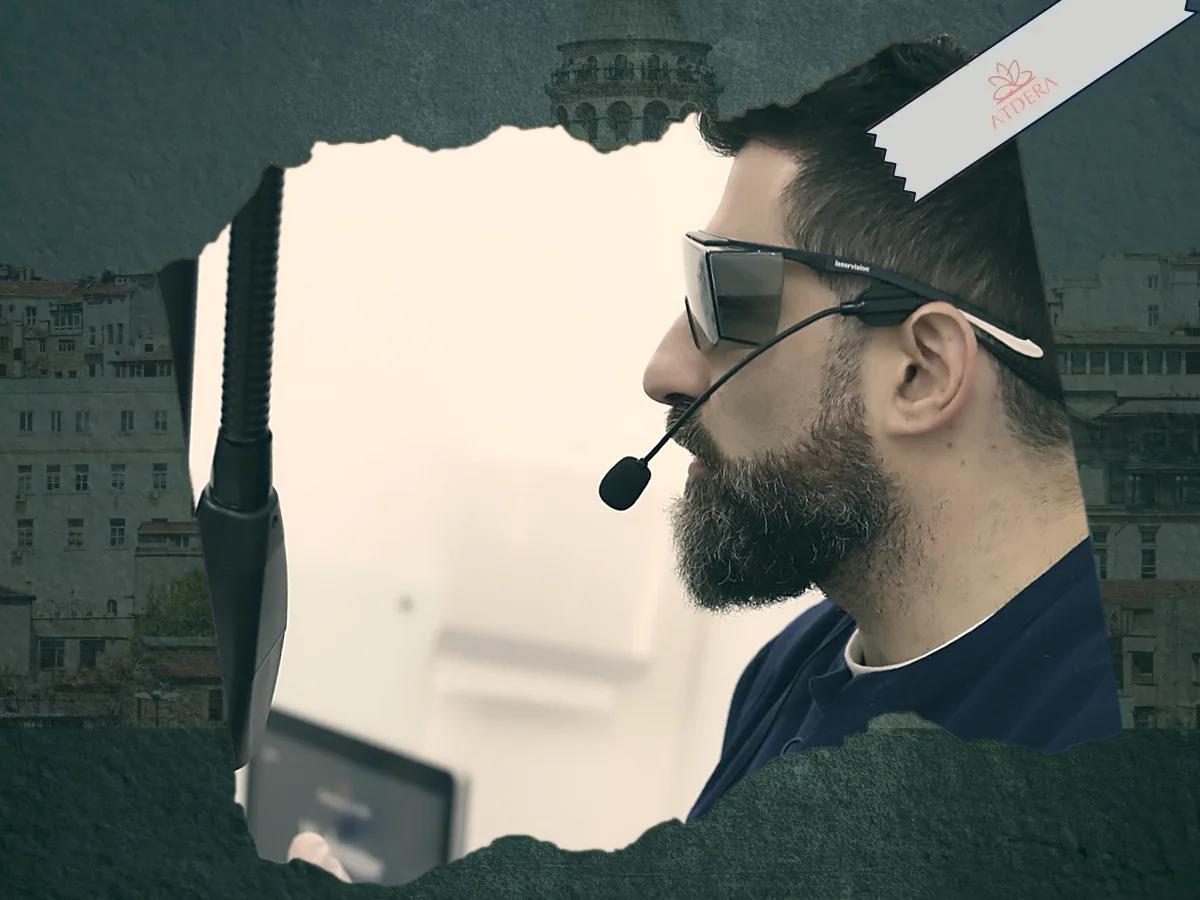 Dr Kavasoğulları during a laser procedure, wearing protective eyewear